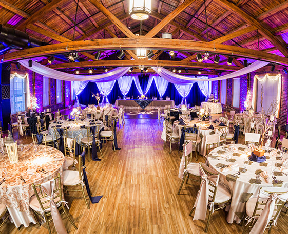 Rustic Wedding Venue with Purple Lighting